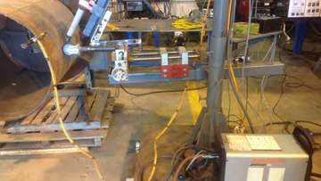 Using a  track cutter to automate the plasma arc gouge process.