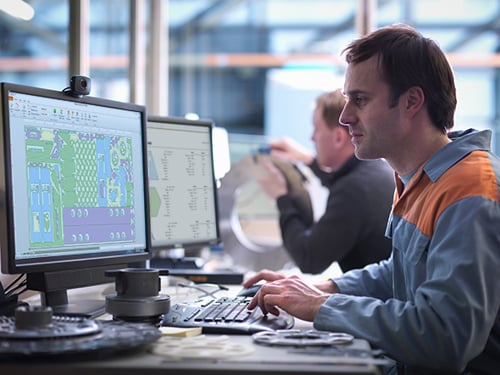 Man using CAD/CAM nesting software